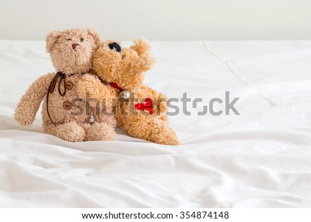 teddy bear and  brown dog  are friends ,love mode