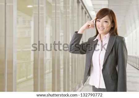 Young business woman think and get an idea, closeup portrait on white background.