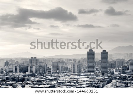 Black and white cityscape with cloudy sky in Taipei, Taiwan, Asia.