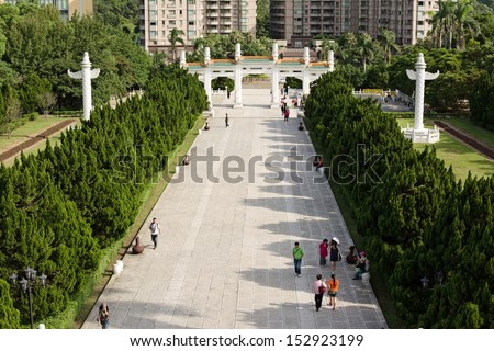 TAIPEI, TAIWAN - SEPTEMBER 4 : Many tourist people walk in and out at Taipei\'s National Palace Museum on September 4, 2013 in Taipei, Taiwan, Asia.
