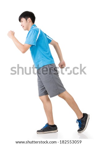 Fitness asian man runs in studio. Isolated on the white background.