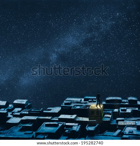 Single businessman standing on the roof under sky of stars, concept of lonely, single, peace etc.
