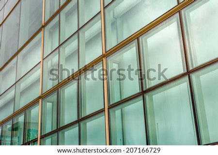 Office glass windows with beautiful reflection in Hong Kong, Asia.