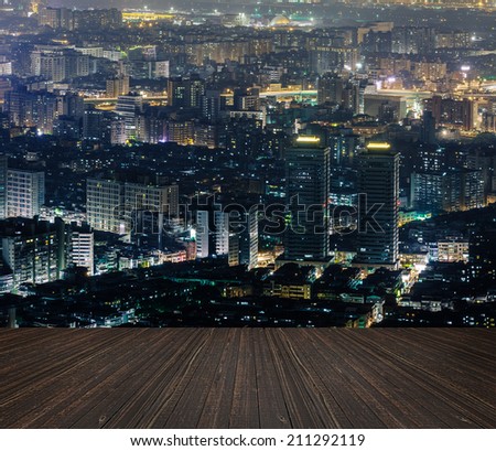 City night scene with wooden ground.