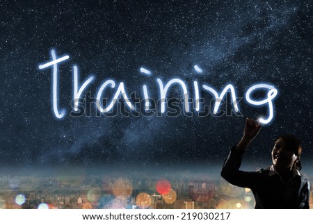 Concept of training, silhouette asian business woman light drawing.