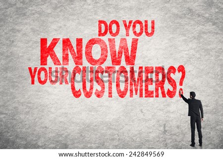 Asian business man write words on wall, Do you Know your Customers?