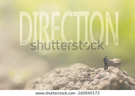 Concept of advice with a person stand in the outdoor and looking up the text over the sky in nature background.