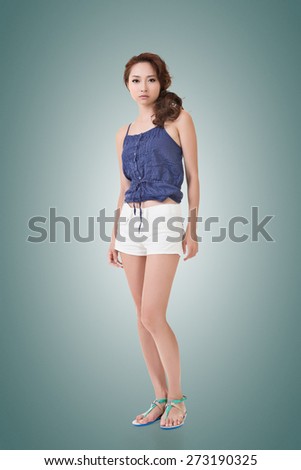 Asian woman, full length portrait isolated on white background.