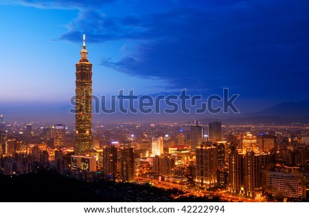 Taipei city skyline with famous skyscraper 101 building in the night, Taiwan.
