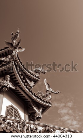 China temple with decorative roof and sky.