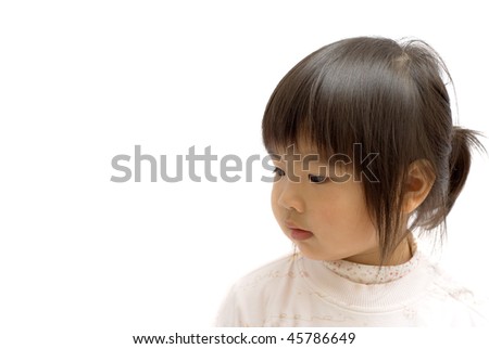 stock photo Asian cute child with black hair and yellow skin face on white