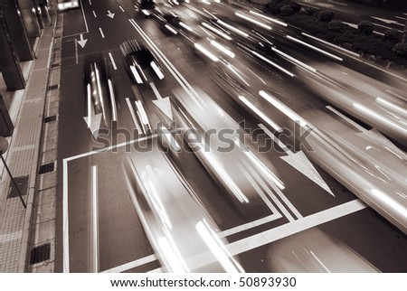 stock photo Cars movement with light in the modern city night
