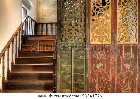 Stair in Chinese traditional style with wooden door.