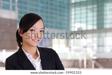 Smiling business woman, closeup portrait in office.