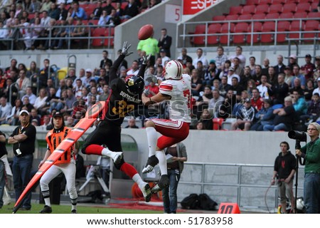 DUSSELDORF, GERMANY - APRIL 24: The 1st German Japan Bowl. Germany and Japan fighting for possession in Duesseldorfs Esprit Arena. On April 24, 2010 in Dusseldorf, Germany