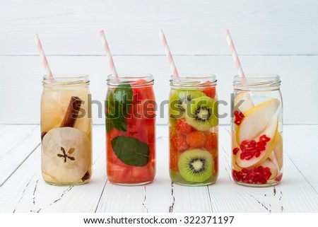 Detox fruit infused flavored water. Refreshing summer homemade cocktail. Clean eating