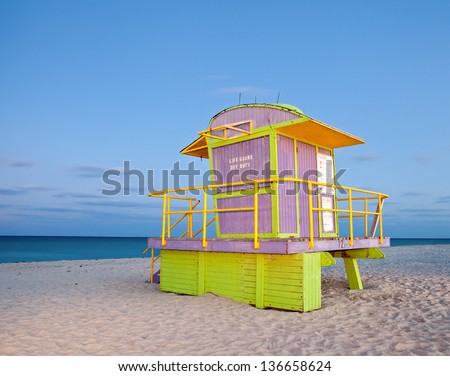 Miami Beach Florida, colorful lifeguard house in typical Art Deco architectural style, long night exposure under moonlight
