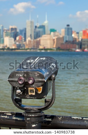 Observation deck with binoculars, view of New York city, Manhattan buildings