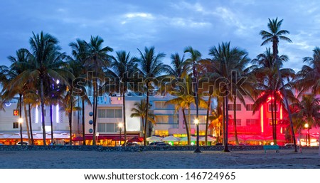 Miami Beach, Florida  hotels and restaurants at sunset on Ocean Drive, world famous destination for it\'s nightlife, beautiful weather, Art Deco architecture and pristine beaches