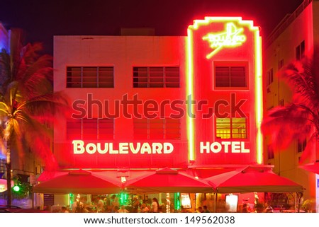 MIAMI BEACH, FLORIDA, USA-AUGUST 9:  Art Deco hotels and restaurants at night on Ocean Drive on August 9, 2013, world famous destination for nightlife, beautiful weather and pristine beaches
