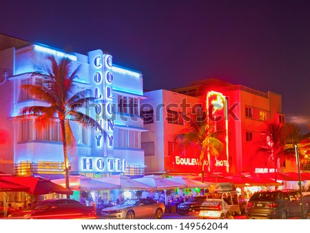 Miami Beach, Florida, Usa-August 9: Art Deco Hotels And Restaurants At Night On Ocean Drive On August 9, 2013, World Famous Destination For Nightlife, Beautiful Weather And Pristine Beaches