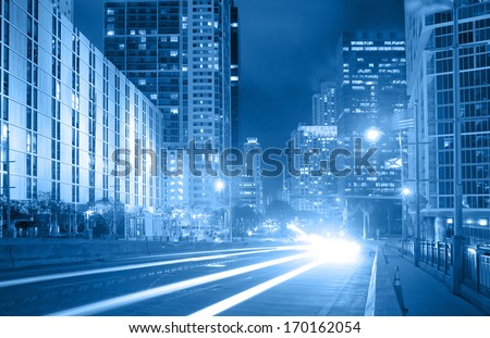 City of Miami Florida, traffic moving through downtown Brickell financial district, blue color processed photo