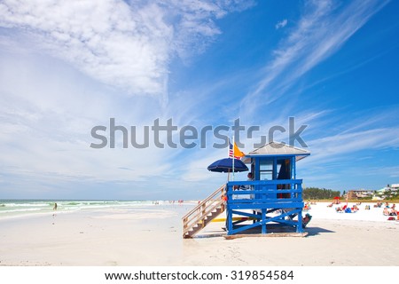 SIESTA KEY, FLORIDA USA-OCTOBER 4, 2013: Blue lifeguard house in Siesta Key on the west coast of Florida. Famous for pristine white sand beaches and sunny weather it attracts visitors all year round
