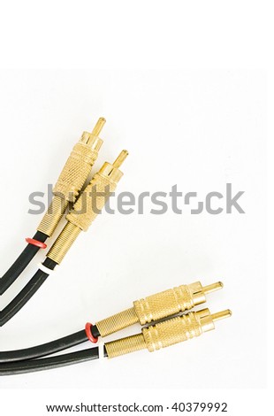 Golden Audio cables closeup isolated on white with copyspace for your text