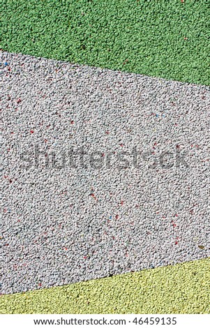 Background texture of colorful crumb rubber used for athletic tracks and children playgrounds