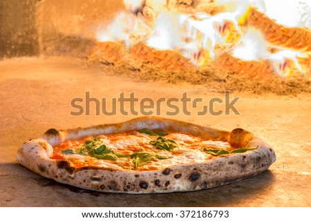 Traditional way baked wood fired oven Italian pizza bakery pizzeria