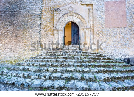 Steps of the past. Moss covered stone stairs outside a church in the small village Erice, Sicily, Italy.