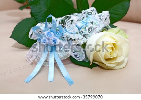 wedding garter from the bride and rose