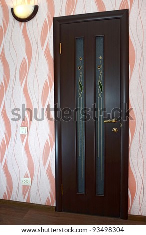 wooden door is in an apartment
