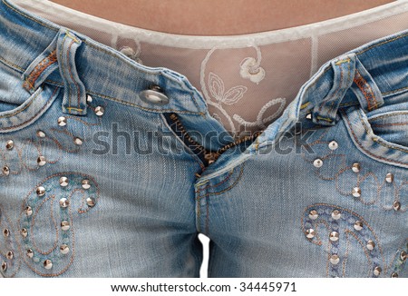 stock photo Girl in white panties and jeans in with open by fly