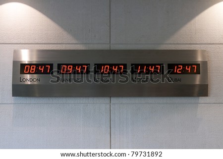Electronic scoreboard showing the time in the five capitals of the world