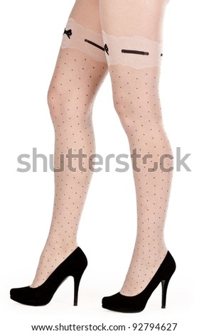 stock photo shapely female legs in pantyhose and shoes with heels in the 