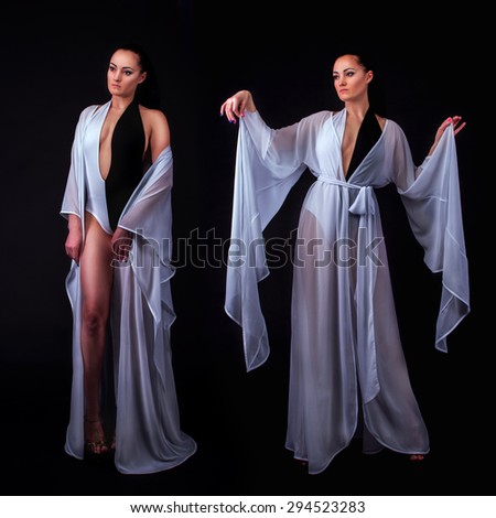 Fashion photo of young magnificent womans in a white Cape and white-black bathing suit. Woman posing. Studio photo