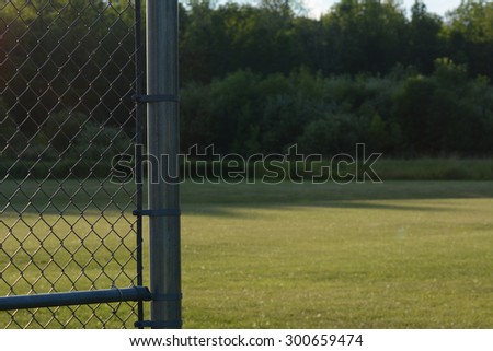 Chain linked fence in field