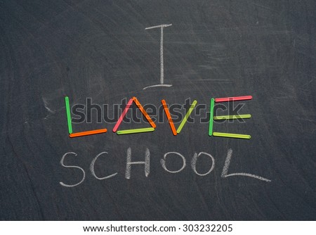inscription on blackboard with chalk and counting sticks \