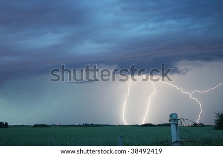 Lightning strike over a wheat field.