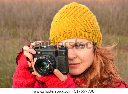 woman with analog camera