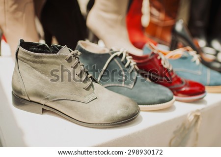 lot of shoes with laces of different colors