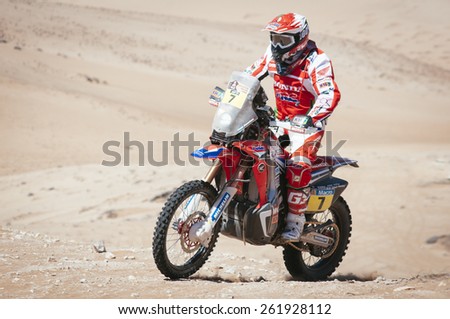 Atacama Desert, Copiapa, CHILE. January 07, 2015. Portuguese moto pilot PAULO GONCALVES race on the sand dunes of the Atacama Desert in Chile during the Chilean stage of Dakar Rally 2015.