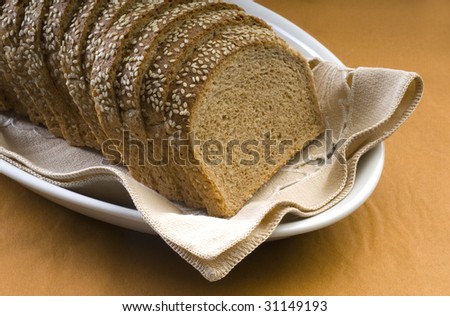 mold rye bread with sesame seeds baked