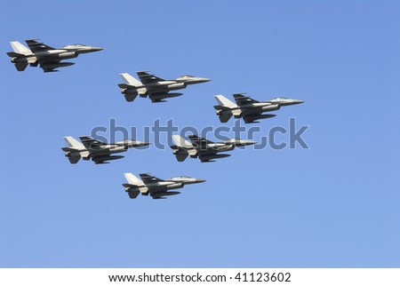 training flight of fighter jets on display