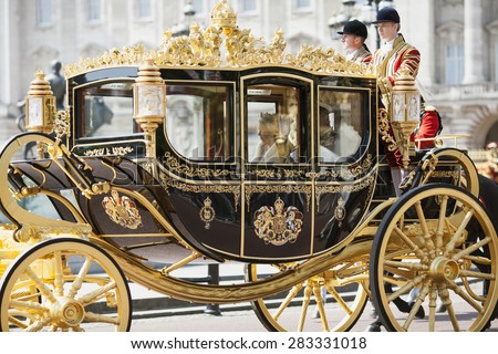 LONDON - UK, MAY 27: Queen Elizabeth II and Prince Philip in the Royal Coach leave Buckingham Palace and go to the State Opening of Parliament on May 27th, 2015 in London, England
