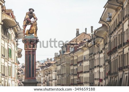 BERN, SWITZERLAND - SEPTEMBER 23, 2014:  Samson fountain view on Kramgasse in the Old City of Bern, Switzerland. It is a Swiss Cultural Property  and is also part of the UNESCO World Heritage.