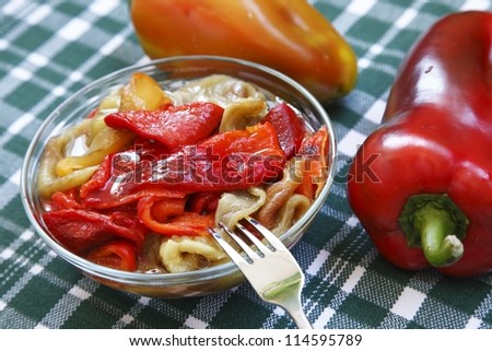 Colorful salad of roasted peppers with two capsicum