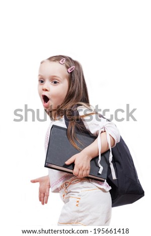 Preschool girl with a satchel protesting that he does not want to school
