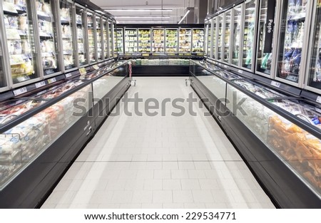 BUCHAREST, ROMANIA - OCTOBER 22, 2014: Commercial refrigerators in a large supermarket
